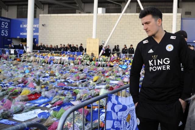 Leicester City and England star Harry Maguire joined team-mates and club officials paying their respects at the King Power Stadium