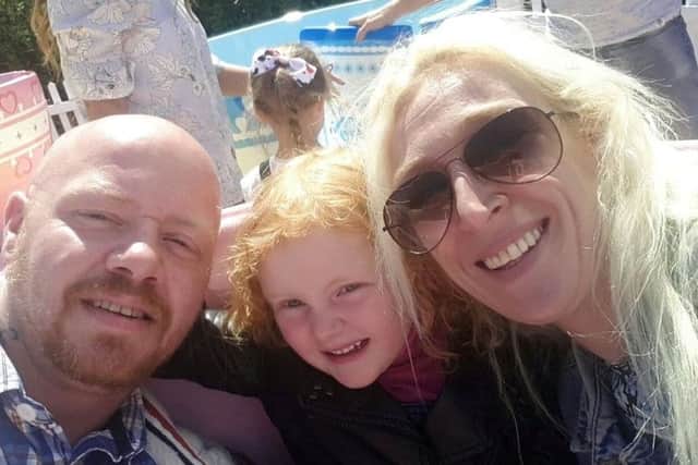 Dad Chris, Cheyenne and Mum Melissa. Picture: SWNS