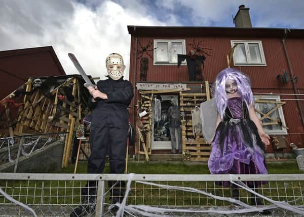 Jack, nine, and Jessica, six, McCallum outside their home in Sighthill Drive.