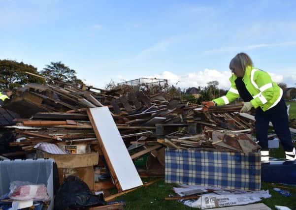 Police have been assisting council workers in removing material from public parks. Picture: TSPL
