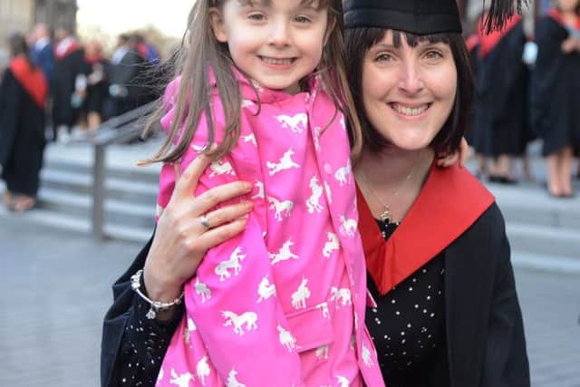 Kelly Lounden and her daughter. Kelly swapped her job at a bank after her daughter needed oepn heart surgery.