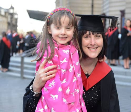 Kelly Lounden and her daughter. Kelly swapped her job at a bank after her daughter needed oepn heart surgery.