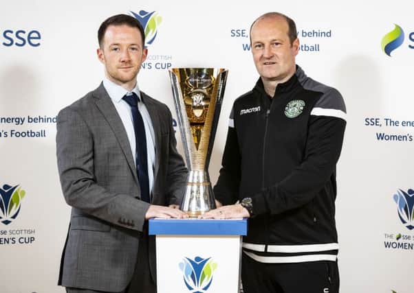 Hibs Ladies manager Grant Scott, right, and Motherwell boss Donald Jennow will battle it out for the new SSE Scottish Womens Cup trophy at Firhill. Pic: Roddy Scott