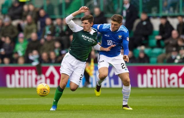 Emerson Hyndman competes with St Johnstone's Ross Callachan. Picture: SNS