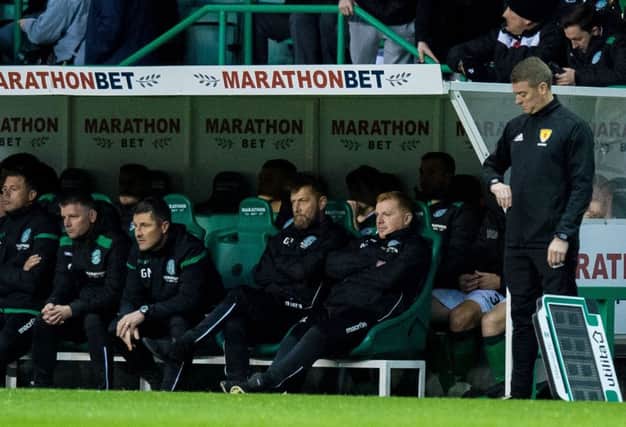 A disgruntled Hibs bench look on as their side lose 1-0 to St Johnstone. Picture: SNS