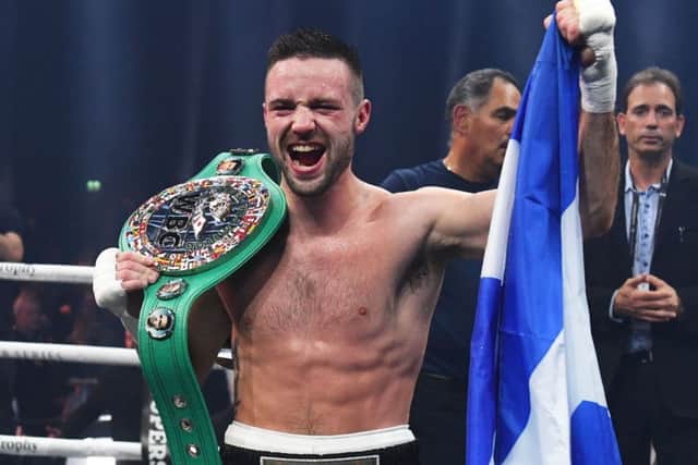 Josh Taylor celebrates after winning the fight in the seventh round
