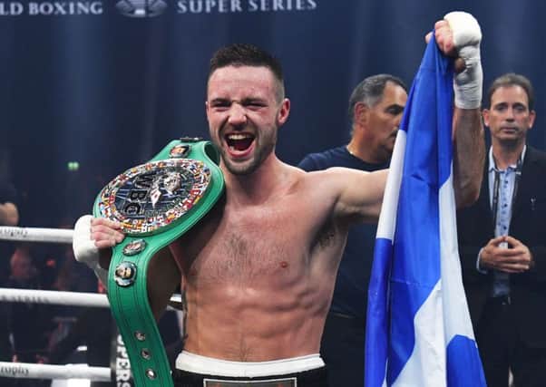 Josh Taylor celebrates after winning the fight in the seventh round