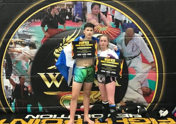 Lewis Inglis and Faith Harvey are both World Champions and ranked No1 in the world for Muay Thai. Picture: Contributed