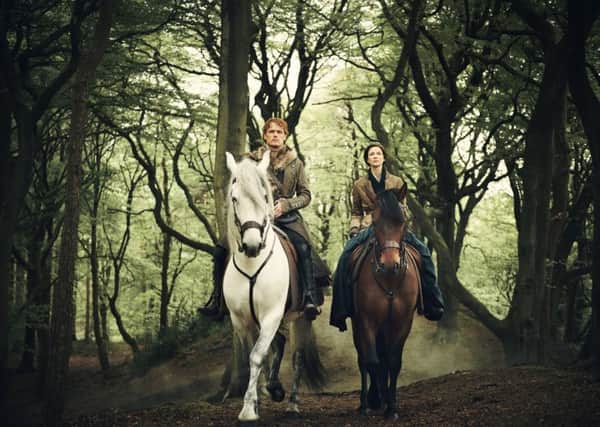 Jamie and Claire Fraser, played by Sam Heughan and Caitriona Balfe, in new season of Outlander. PIC: Starz/Jason Bell.