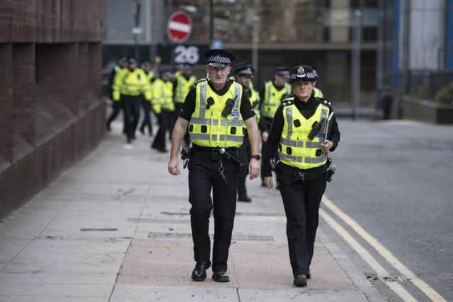 Police numbers in Scotland's fastest-growing city are falling. Picture: John Devlin