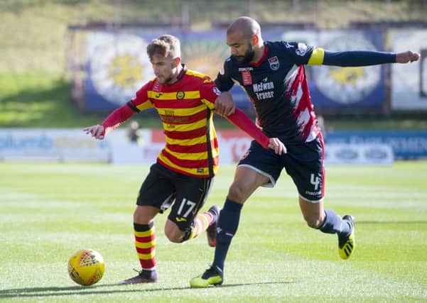 Liam Fontaine, right, has helped Ross County to second place in the Championship
