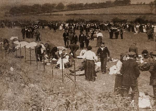 Gretna villagers assist with the wounded in the immediate aftermath of the diaster.