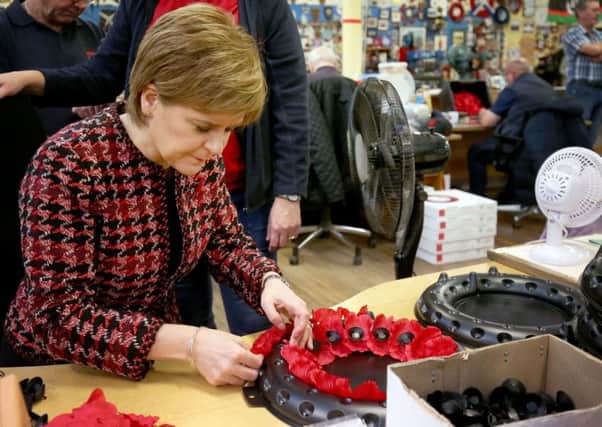 First Minister Nicola Sturgeon will lay a wreath
