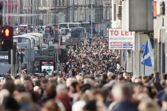Shopping along Edinburgh's Princes Street on the last saturday before Christmas.