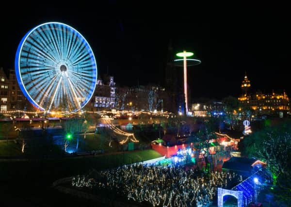Nearly a million people are now flocking to Edinburghs seven-week-long Christmas festival, according to new research which claims the event is now worth Â£113 million to the citys economy. Picture: Andrew O'Brien: