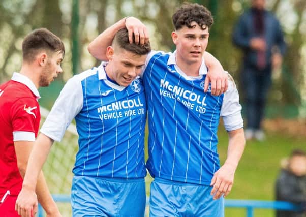 Sean Melvin, left, celebrates with Ryan Porteous after putting Newtongrange Star one up. Pic: Ian Georgeson