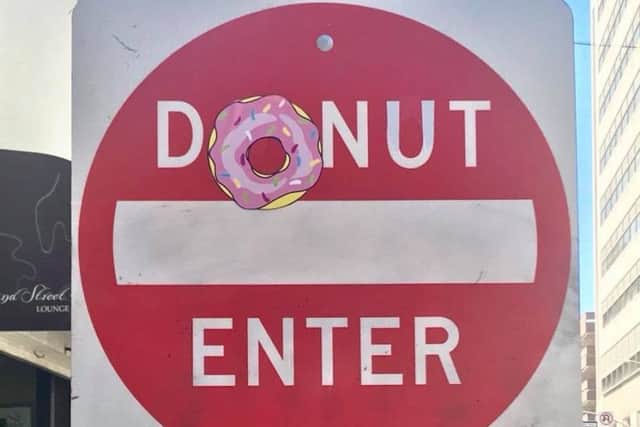 Clet Abraham has altered street signs around the world. Picture: Facebook