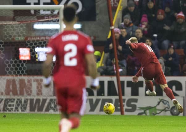 Gary Mackay-Steven lashes home the only goal for Aberdeen