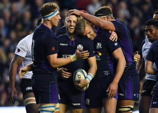 Scotland's Tommy Seymour celebrates his second try. Pic: SNS/SRU/Gary Hutchison