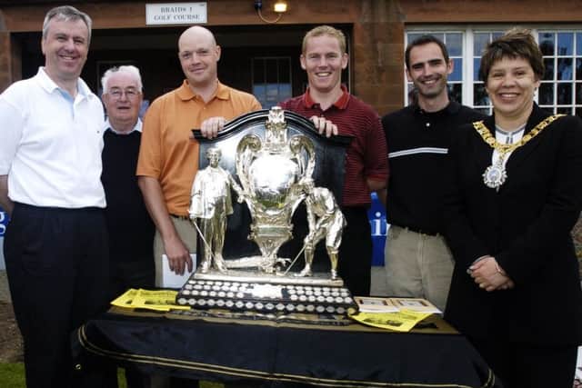 Jimmy Wilkinson, second left, with members of the 2004 Dispatch Trophy-winning team, Scott 
Knowles, Brian Smith, David Miller and Mark Chambers with then Lord Provost Lesley Hinds