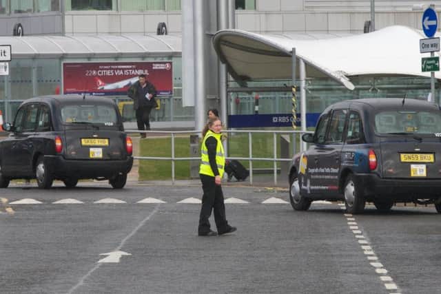 There have been disagreements between rival firms at Edinburgh Airport's taxi rank. Picture: EN