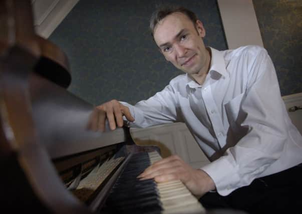 Stuart Mitchell, a local pianist and composer, pictures at The Balmoral Hotel.  PIC: Kate Chandler.