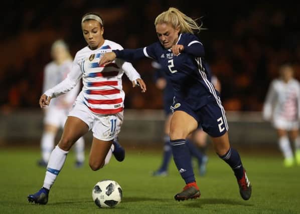 Kirsty Smith challenges Mallory Pugh of the USA