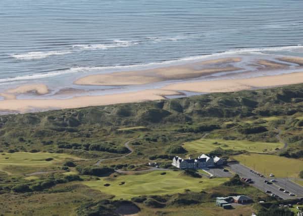 Trump International wants to build 500 houses plus holiday homes, an equestrian centre, shops and restaurants by its golf course at Menie, Aberdeenshire (pictured). PIC:  Cabro Aviation/Creative Commons.