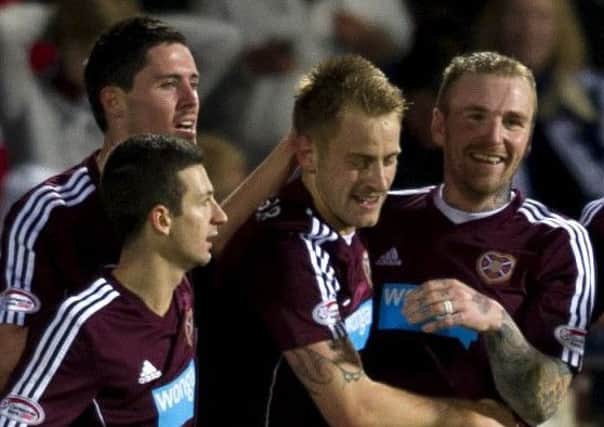 Hearts celebrate with Danny Grainger, second from right