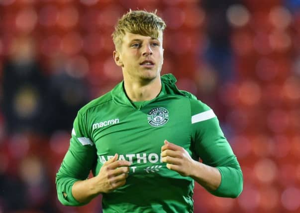 Sean Mackie received a surprise promotion to the Hibs bench at Pittodrie before being handed his debut