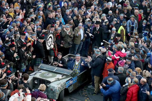 Former Scotland rugby international Doddie Weir is driven to Murrayfield stadium after hosting 'The Gathering of 10,000 Headbands' at Edinburgh's Mercat Cross, a fundraising event to support the My Name'5 Doddie Foundation. Picture: Jane Barlow/PA Wire
