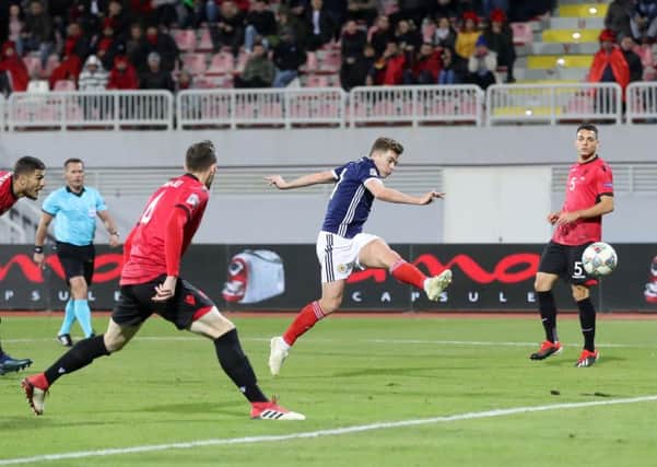 Scotland's James Forrest scores his side's fourth goal of the game. Pic: Adam Davy/PA