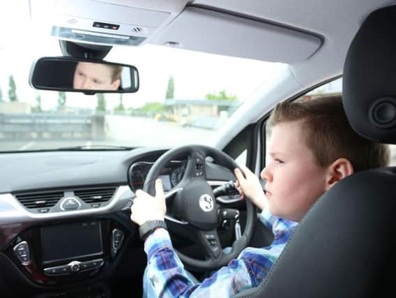 A young driver behind the wheel. Pic: Supplied on behalf of young drivers