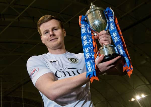Blair Henderson, who scored against Alloa, with the Irn-Bru Cup. Picture: SNS Group