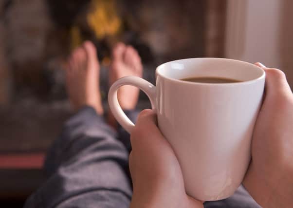 Danish hygge is all the rage  now Scots have their own version of relaxing with a warm cuppa on the couch. Picture: PA