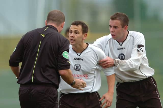 Jean Ferriera argues with referee Wille Hornby after he is booked for a second time after fighting breaks out during City's second goal celebrations. Pic: JPIMedia