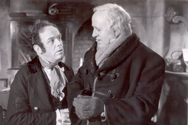 1951 film " SCROOGE " with 
Alastair Sim (right)