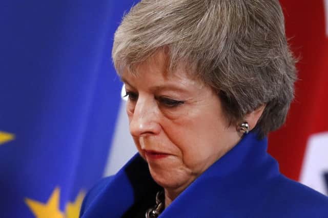 Theresa May lost the vote on her Brexit deal. (Picture: AP Photo/Alastair Grant)