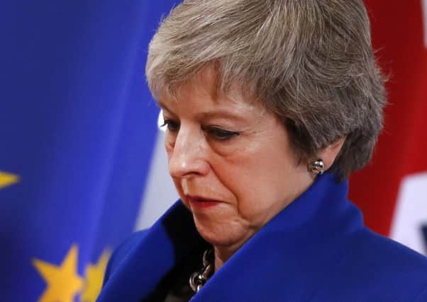 Theresa May lost the vote on her Brexit deal. (Picture: AP Photo/Alastair Grant)
