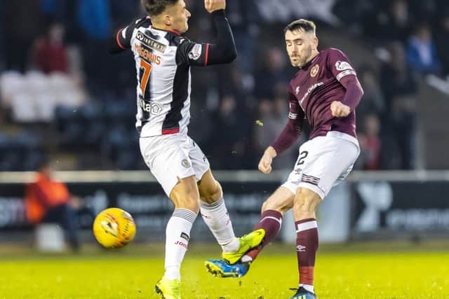 Michael Smith took a heavy challenge from Kyle Magennis during Hearts defeat at St Mirren on Saturday. Pic: SNS
