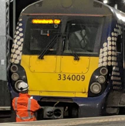 An engineer working on the ScotRail train.