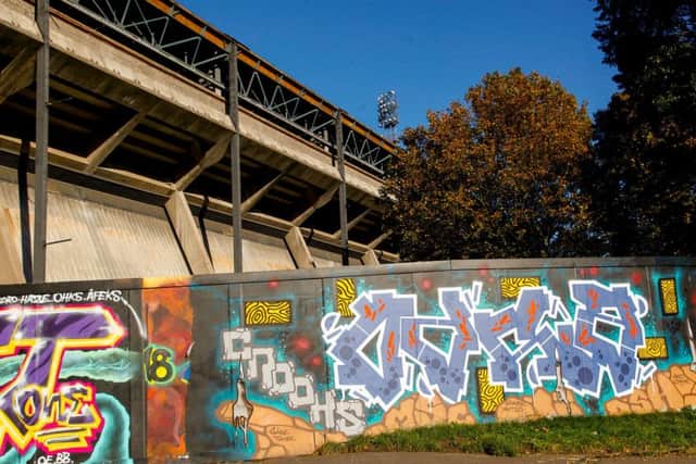 Work to dismantle Meadowbank Stadium is under way. Picture: Scott Louden