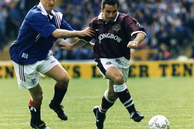 Sport for all: John Colquhoun remonstrated with Hearts fans who threw bananas at Mark Walters (Picture: Jeremy Stockton)