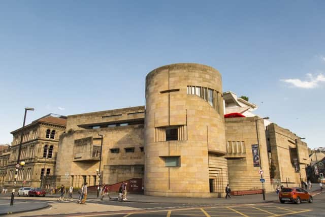 Designed by Benson and Forsyth at a cost of Â£45m, the new building was opened by the Queen on St Andrew's Day 1998.