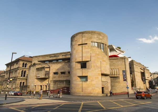 Designed by Benson and Forsyth at a cost of £45m, the new building was opened by the Queen on St Andrew's Day 1998.