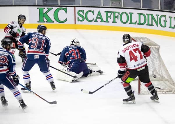 Richard Hartmann, top left, scored a hat-trick in the 5-5 deaw with Dundee Comets last week
