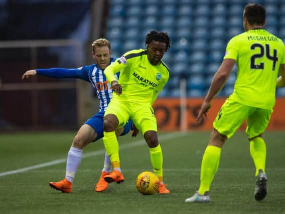 Miquel Nelom started his first game for Hibs in yesterday's 3-0 defeat at Kilmarnock. Pic: SNS
