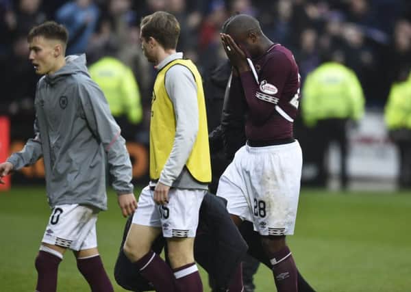 Hearts players trudge off at full time. Pic: SNS