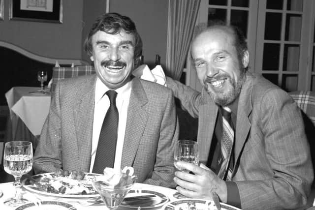 Evening News columnist John Gibson has lunch with author Leslie Thomas (left) in Edinburgh, October 1981.