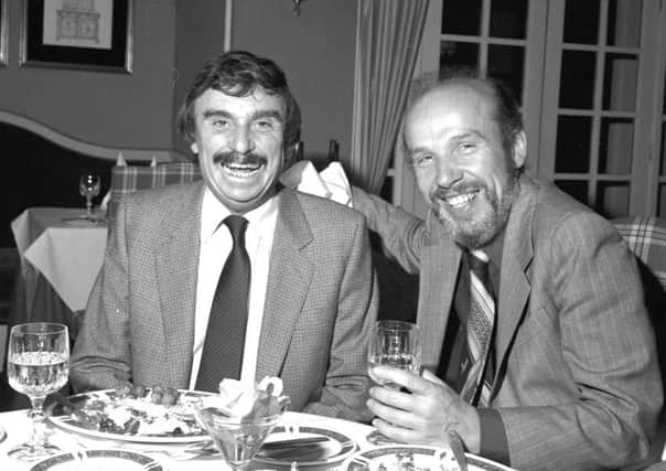 Evening News columnist John Gibson has lunch with author Leslie Thomas (left) in Edinburgh, October 1981.